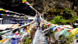 Vivid bridge with prayer flags